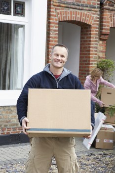 Professional house removals in Teddington with moving van and packed boxes