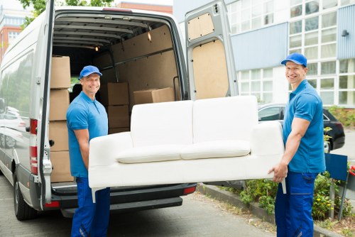 Professional removals in Teddington with a moving van outside a residential street