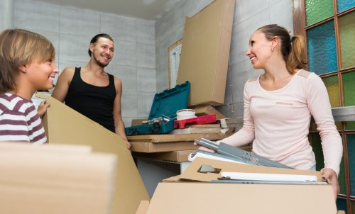Boxes and stored household items in a secure Teddington storage space