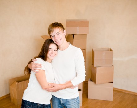 Careful wrapping of fragile items during a Teddington house move
