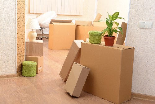 Packed boxes and furniture ready for a flat removal in Teddington