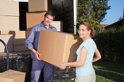 Removals team loading furniture for house removals in Teddington